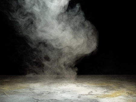 A jet of white smoke over a concrete surface as a background for product presentationの写真素材