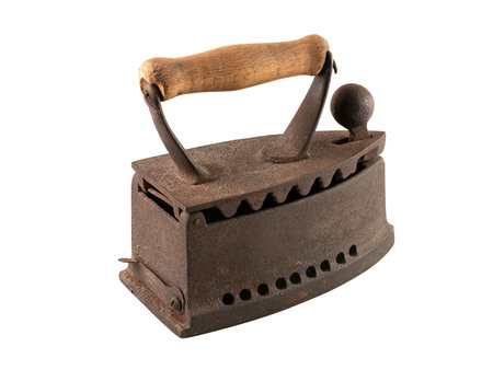 Antique rusty smoothing iron isolated on white backgroundの写真素材