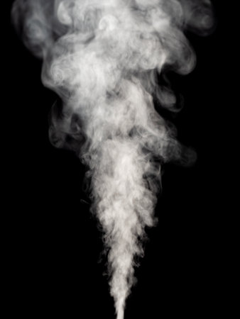 White smoke steam rising up isolated on a black backgroundの写真素材