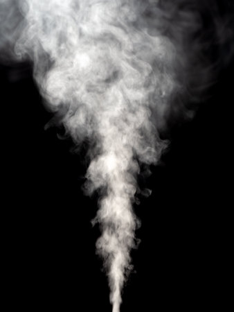 Effect of rising white smoke isolated on a black backgroundの写真素材