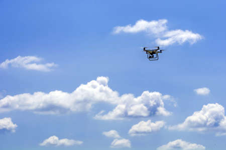drone on a sunny day against the sky and cloudsの写真素材