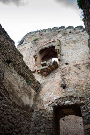defensive walls and fortifications of a medieval castleの写真素材