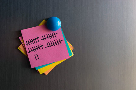 account of days on a sticker for sticky notes attached to the refrigerator