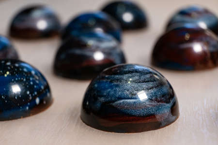 handmade chocolates and sweets in the making.の写真素材