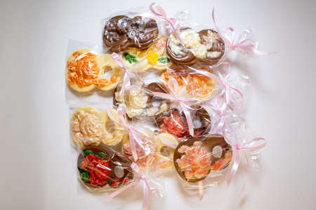 multicolored beautifully decorated handmade candies with fillings.の写真素材