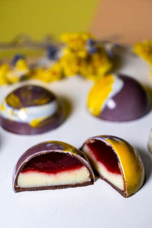 multicolored beautifully decorated handmade candies with fillings.の写真素材