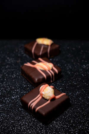 multicolored beautifully decorated handmade candies with fillings.の写真素材