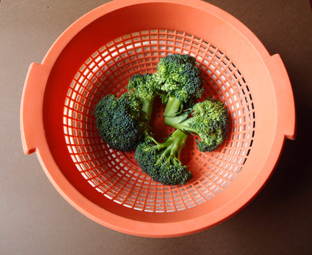 Broccoli and colander