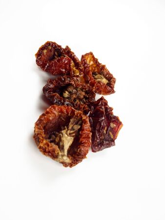 Dried tomatoes on white backgroundの写真素材