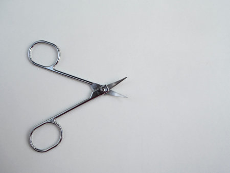 Nail scissors on white background