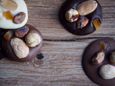 Pieces of black, white and chocolate with milk