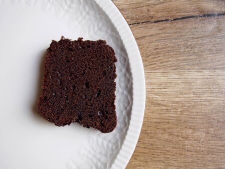 Chocolate cake in a white plateの写真素材