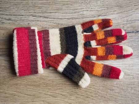 Glove on wood backgroundの写真素材