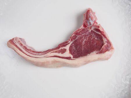 Lamb chop on white plateの写真素材