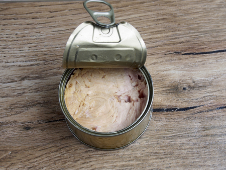 Tuna canned on wood backgroundの写真素材