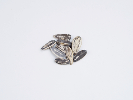 Sunflower seeds on white backgroundの写真素材