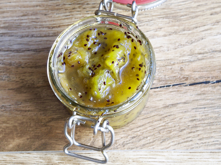 Kiwi jam on wood backgroundの写真素材