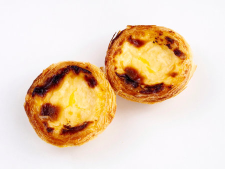 Custard tarts on white background