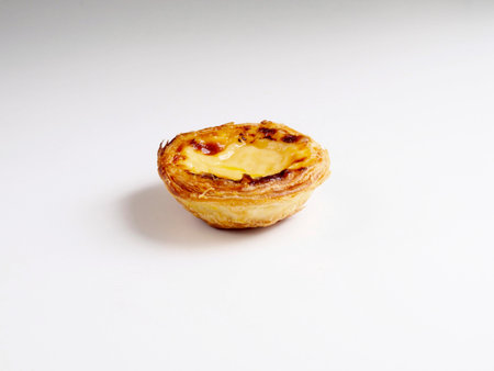 Custard tart on white background