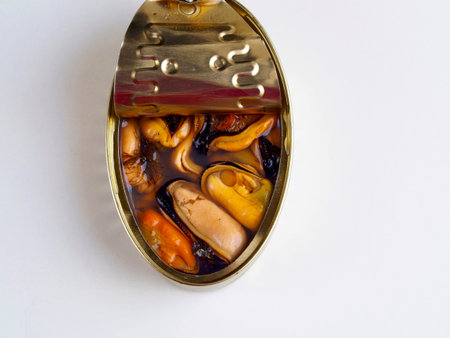 Natural mussels canned on white backgroundの写真素材