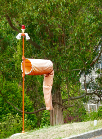 Deflated windsock sign no wind