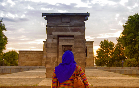 Woman looking at Debod Temple in Madridの写真素材