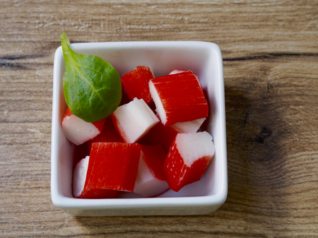 Surimi in a recipe on wood backgroundの写真素材