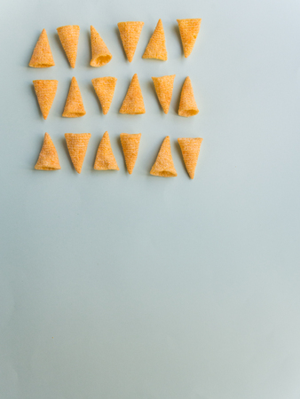 Corn cones pattern on green background with copy spaceの写真素材