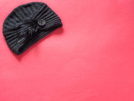 Black woman turban on red background with copy space