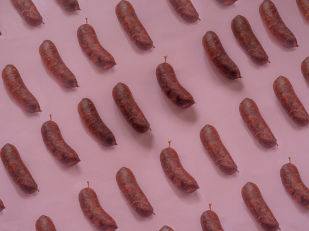 Spanish sausage pattern on pink backgroundの写真素材