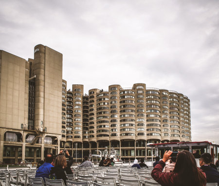 Tourist in a sightseeing cruise taking photos to the buildings in Chicago - United States