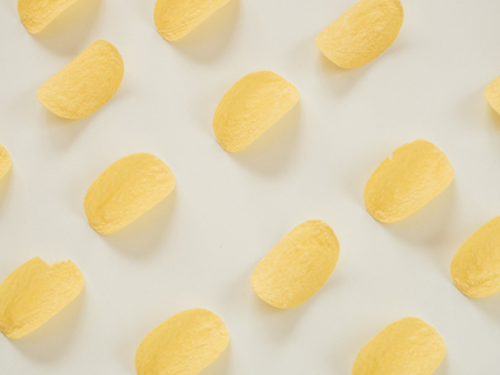 Potato chips pattern on white backgroundの写真素材