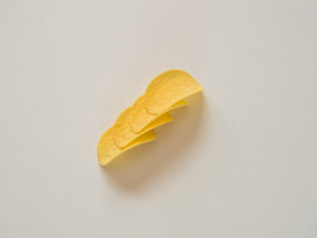Potato chips on white background