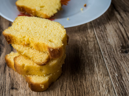 Slice yogurt cake on the table
