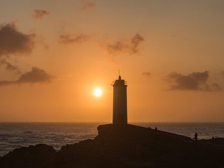 Roncudo lighthouse in the sunset in A Coruna - Spainの写真素材
