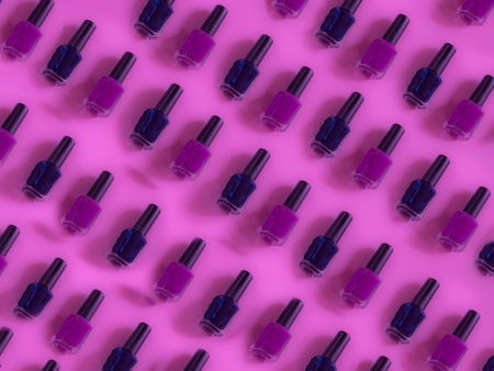 Nails  polish bottle pattern on pink background