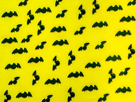 Bat pattern for halloween on  yellow backgroundの写真素材