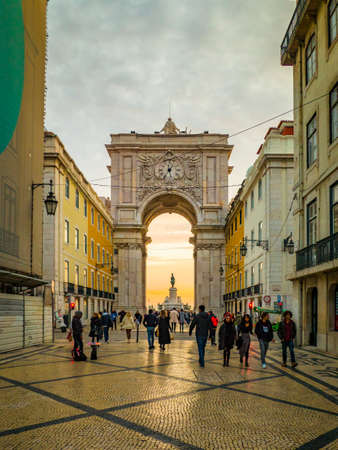 Lisbon - Portugal, January 17, 2020, People in a street of Lisbon with Rua Augusta Archのeditorial素材