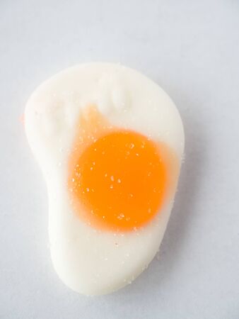 Egg jelly candy macro on white backgroundの写真素材