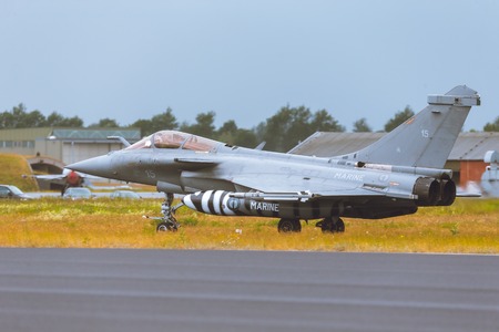 Schleswig - Jagel, Germany - June 19, 2014: Schleswig - Jagel, Germany - June 19, 2014: Dassault Rafale board number 15 taxiing on runway after landing during Tiger Meet 2014のeditorial素材