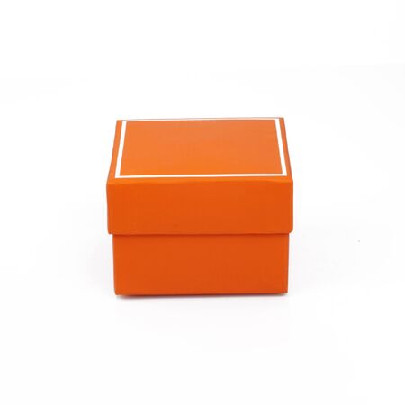 Orange closed box isolated on white backgroundの写真素材
