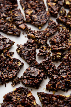 chocolate cracknell a firm, crunchy dessert of cornflakes, cocoa and butter with golden syrup