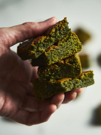 Matcha brownies. Twist on classic brownies recipe made with matcha powder and white chocolate. Moist and soft textureの写真素材