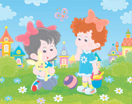 Cute little girls playing with a small toy rabbit among flowers on green grass of a lawn against a background of colorful houses of a small town, illustration in a cartoon styleのイラスト素材