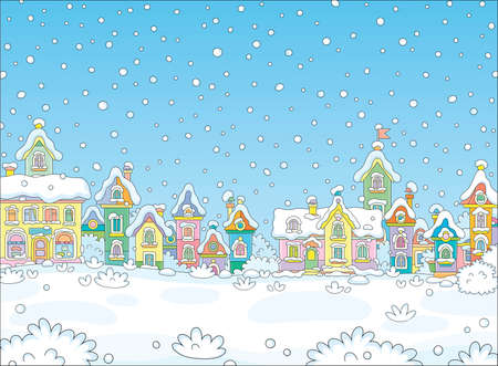 Christmas background with pretty colorful houses of a small toy town on a cold and snowy winter day, vector cartoon illustrationのイラスト素材