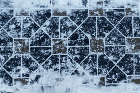 paving slabs under the snowの写真素材