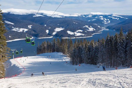 Ski Resort above a lake  View from the slopeの写真素材