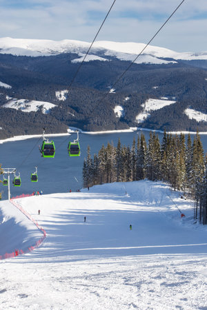 Ski Resort above a lake  View from the slopeの写真素材