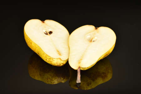 Ripe juicy, organic pears, close-up, on a black background.の写真素材