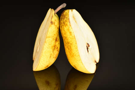 Ripe juicy, organic pears, close-up, on a black background.の写真素材